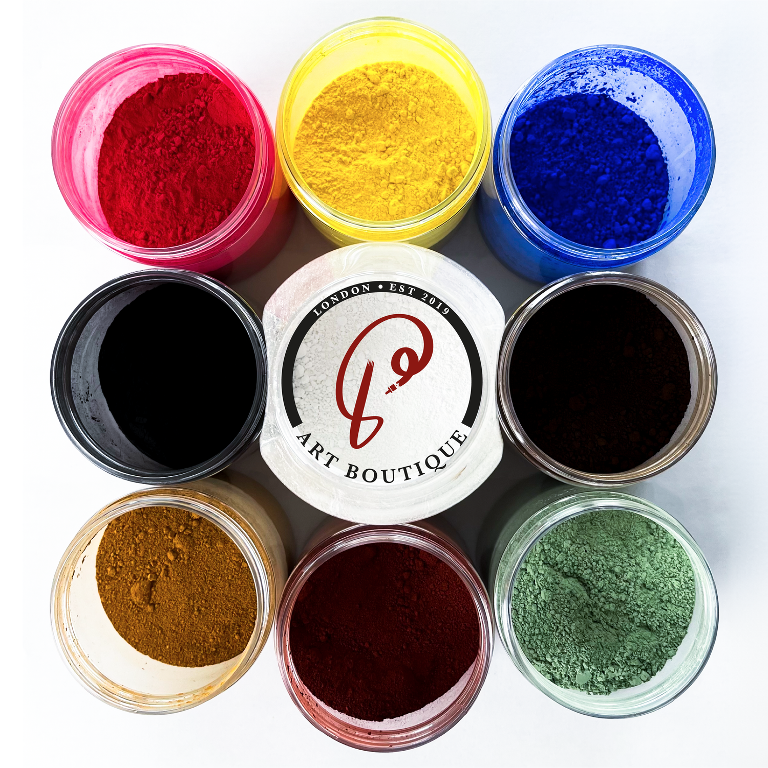 Assorted natural and synthetic pigments in containers, highlighting the variety of colours available from P9. artisan pigments,historical art pigments, Natural pigments